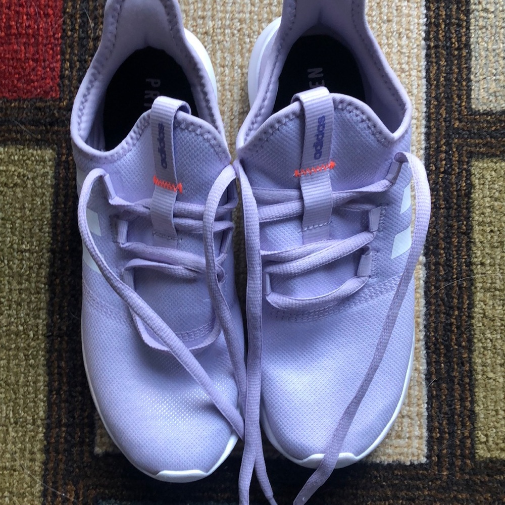 Women’s size 9 Adidas slip on lavender sneaker.
